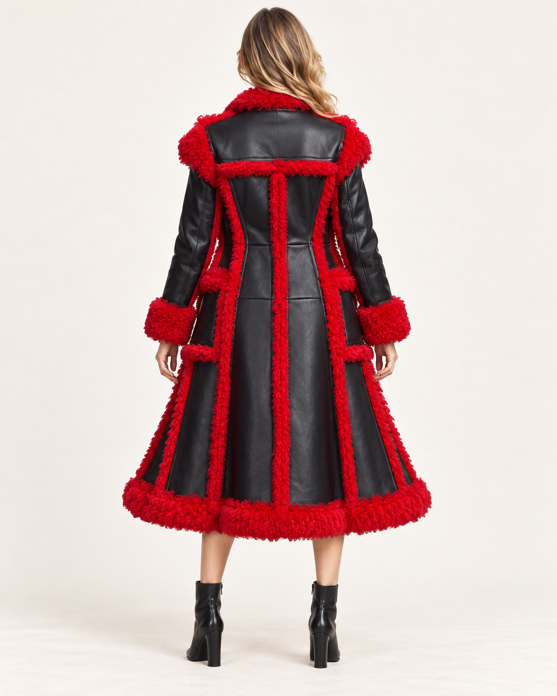 Back view of red faux shearling trench coat showing panel detail